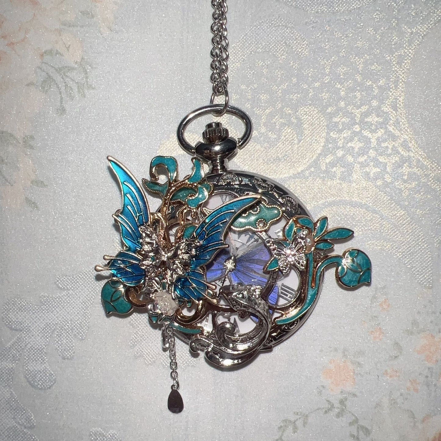 Montre de poche vintage à papillon mobile 