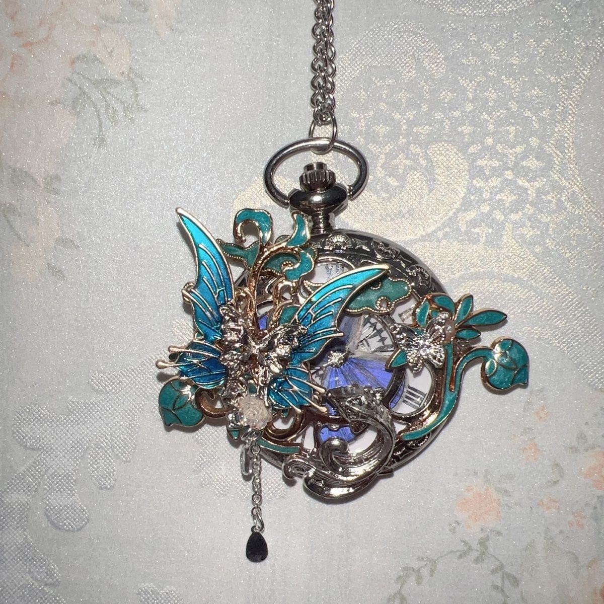 Montre de poche vintage à papillon mobile 