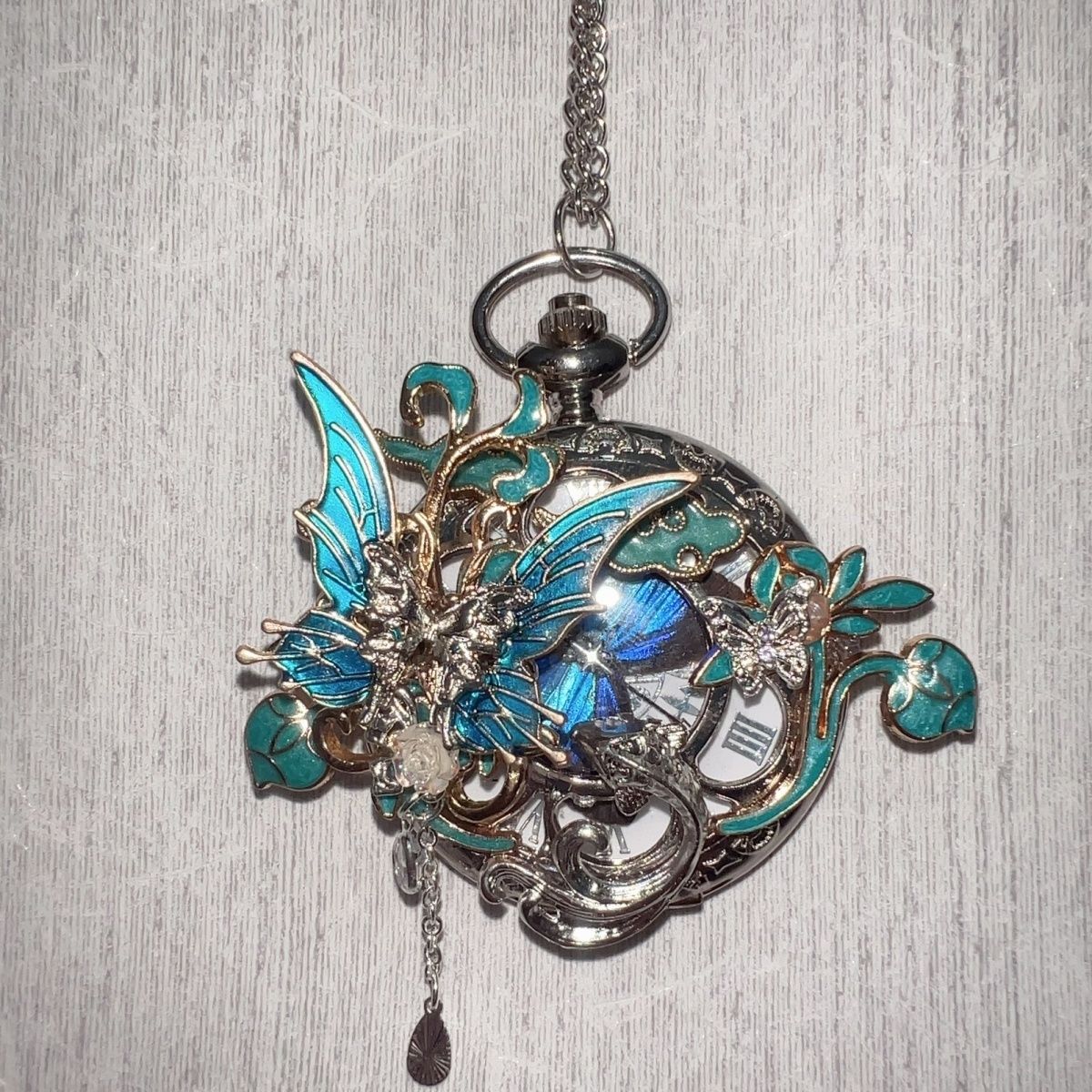 Montre de poche vintage à papillon mobile 