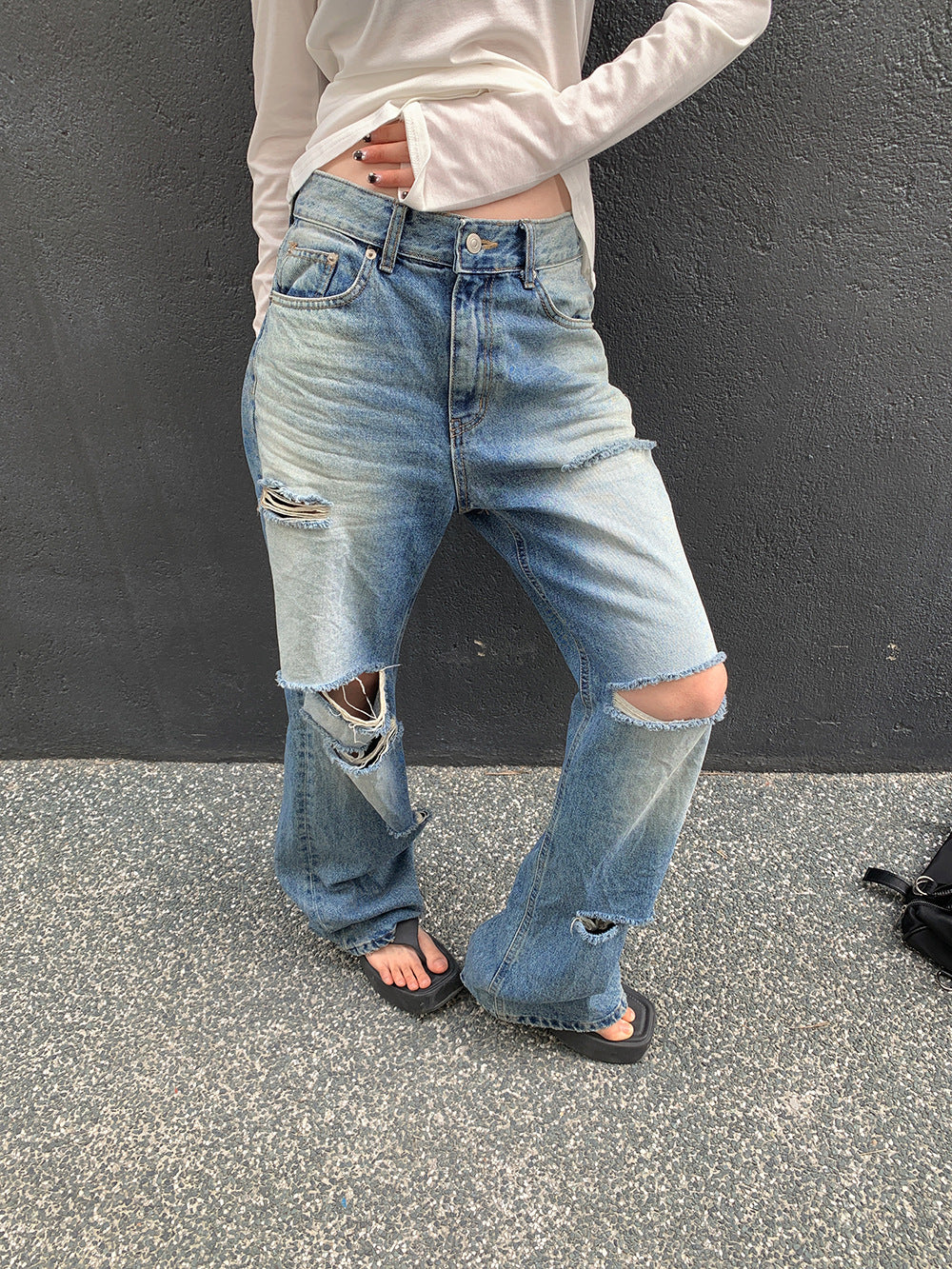 Pantalon en jean évasé délavé 